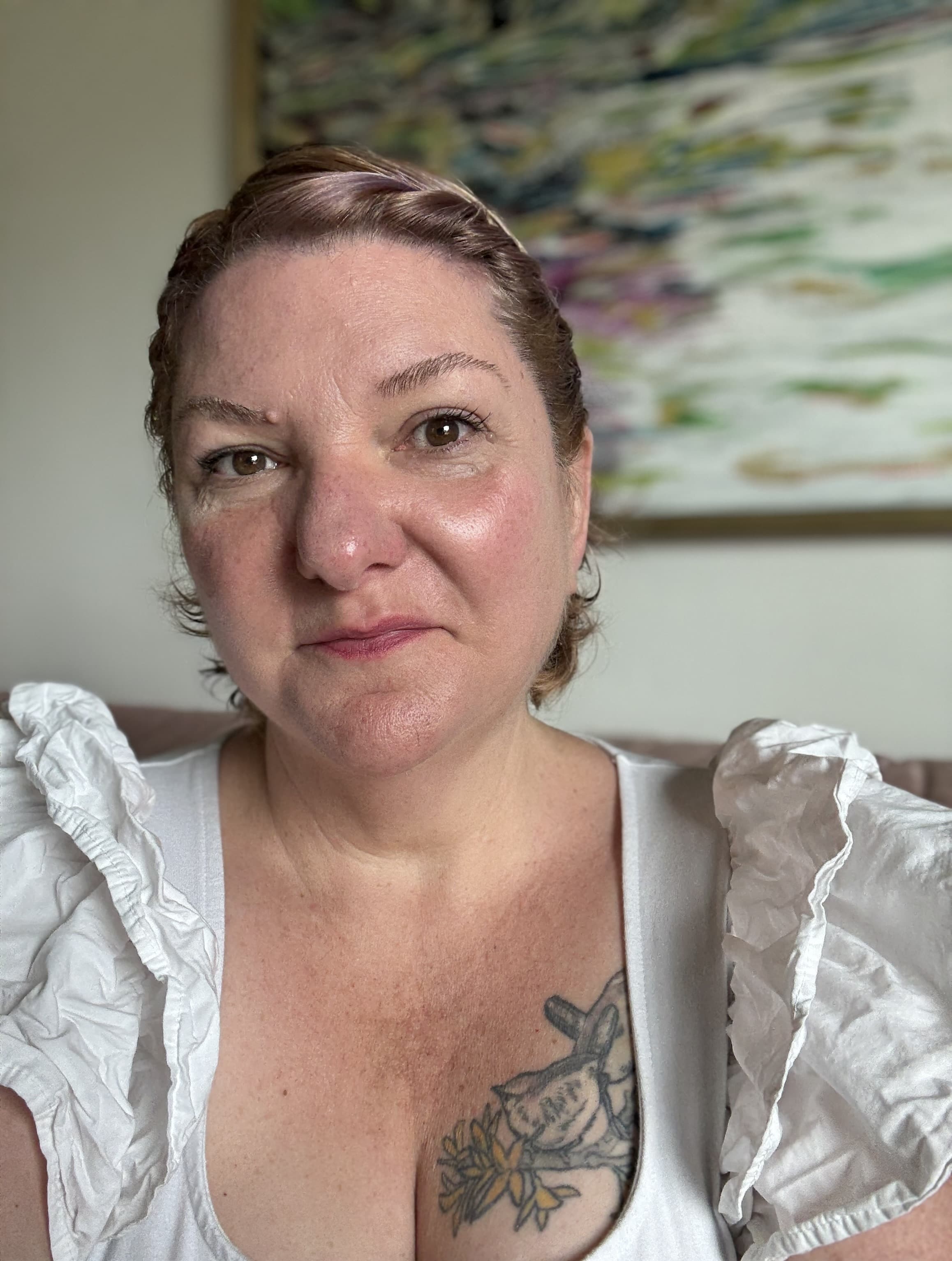 A headshot of Traci Thrash, the doula of The Change.